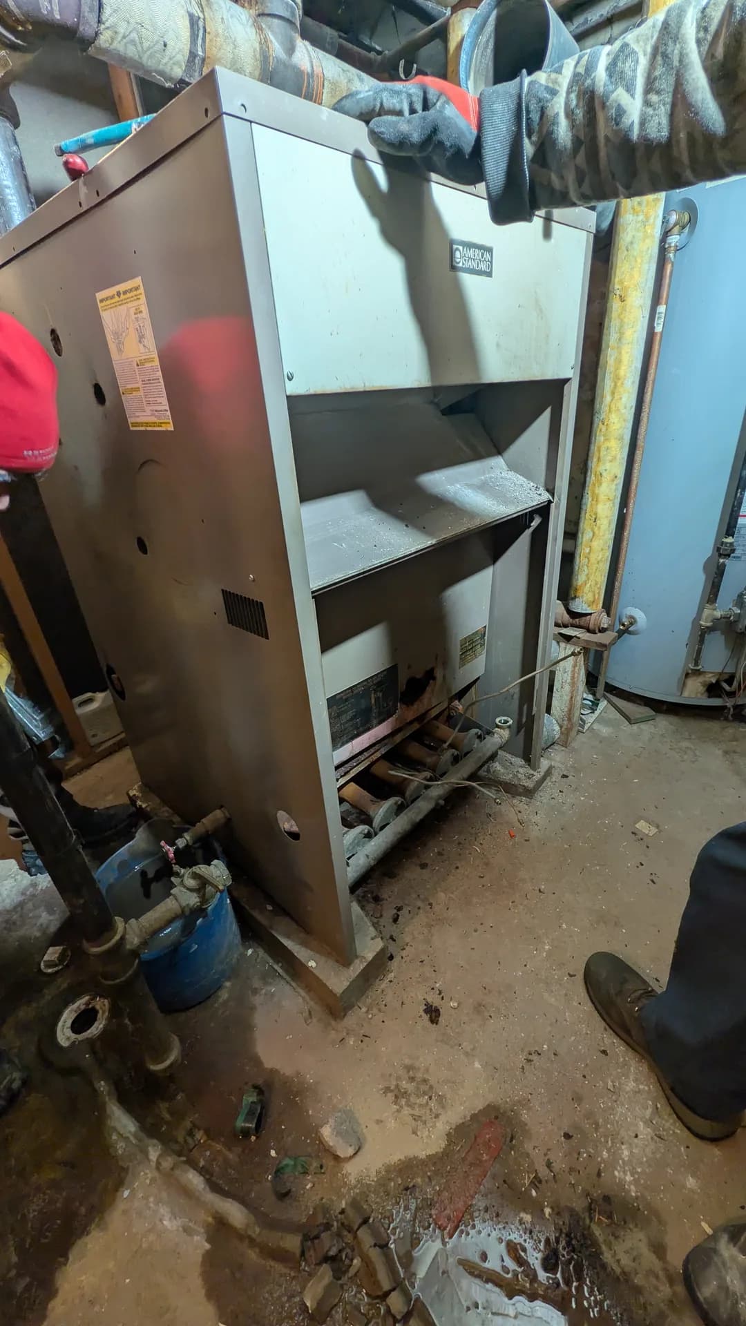 Furnace Maintenance & Tune-Up Chicago — opened boiler cabinets during a heating-system replacement
