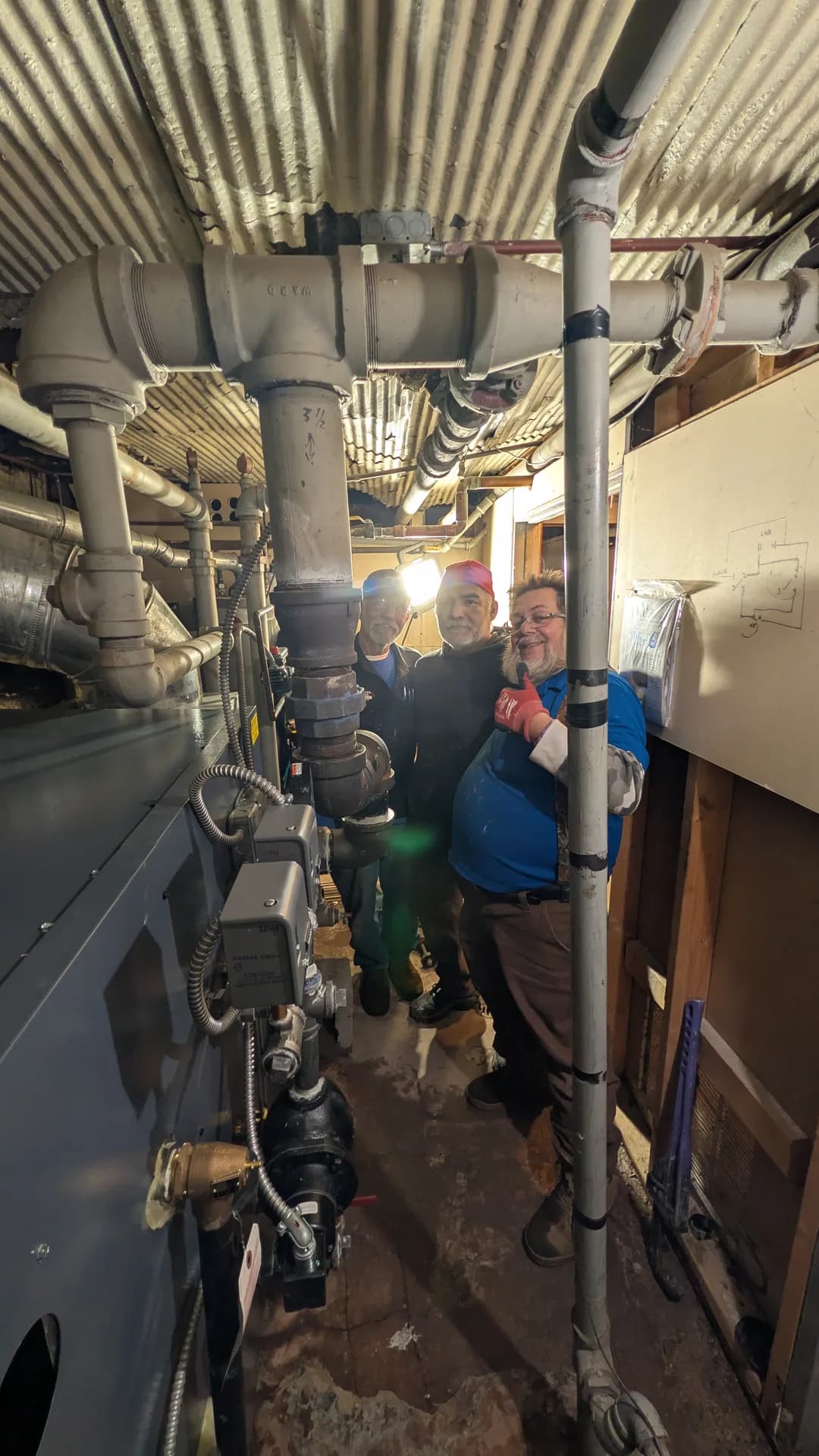 Radiant Floor Heating Chicago — new steam boiler installation with overhead radiator piping