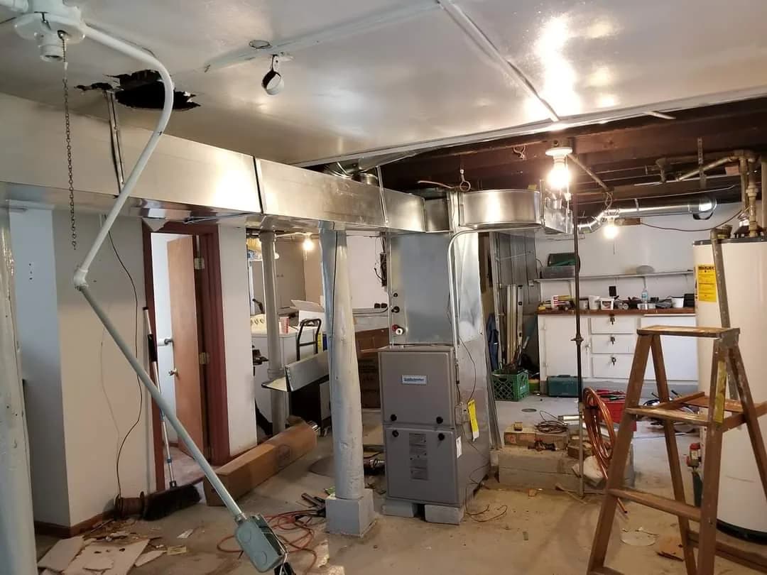Ductwork Installation & Repair Chicago — residential furnace and ductwork installation in progress
